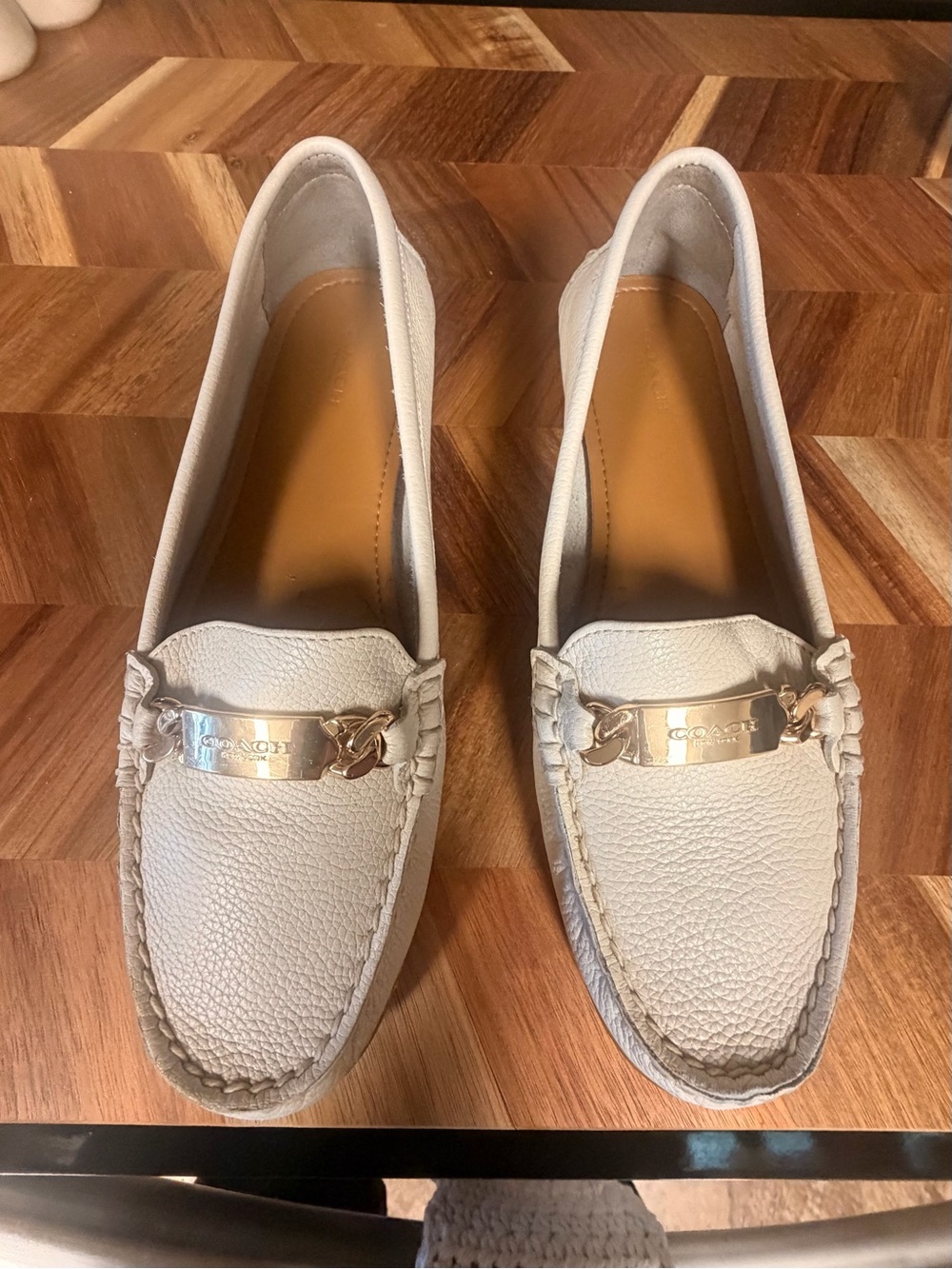 Coach Women’s Size 9 Chalk White Leather Moccasin Loafers with Gold Logo Plaque